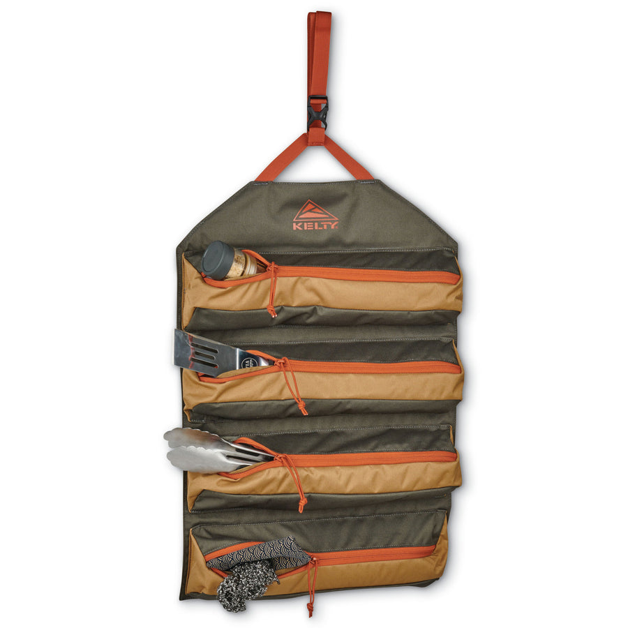 Kelty Chef Roll, front view, unrolled, with kitchen supplies in storage pockets