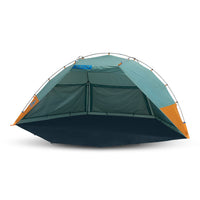 Kelty Cabana shelter, green, front view, with privacy wall unrolled and laying on ground