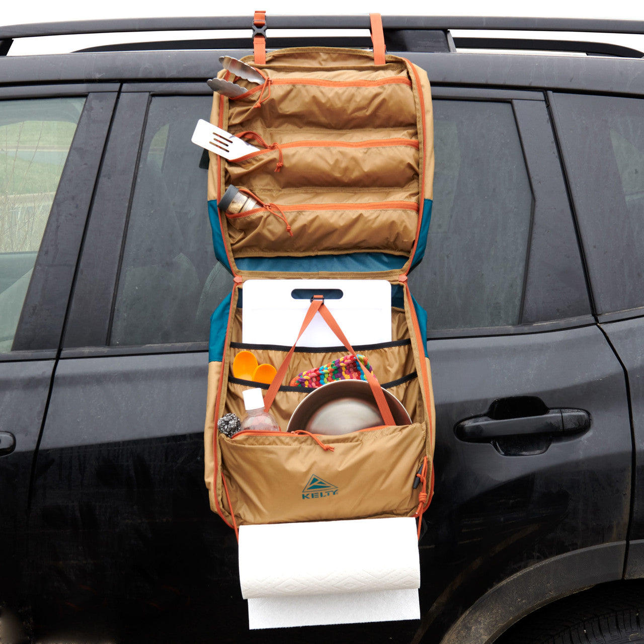 Kelty Camp Galley hanging on the side of an SUV