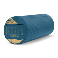 Kelty Galactic SI  Sleeping Pad, shown packed inside blue stuff sack