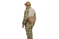 Soldier wearing lid from Kelty Falcon 4000 backpack on his waist, fanny-pack style