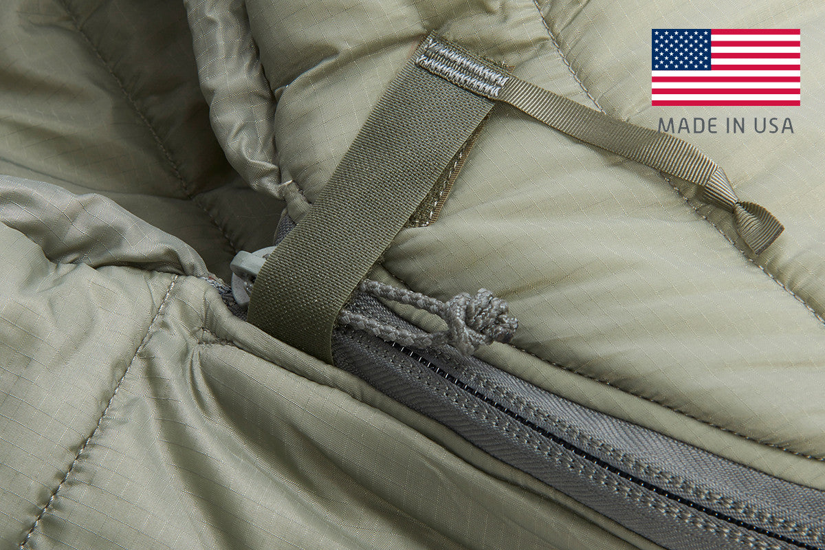 Close up of Kelty VariCom Gamma USA  sleeping bag, showing how top of zipper is secured with a strip of hook and loop fabric